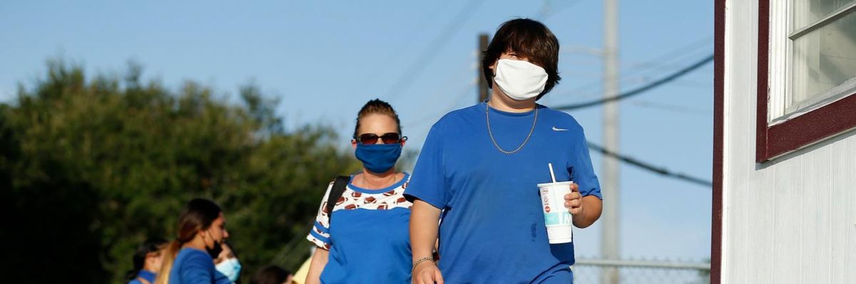 Students wear face coverings at a school in Texas.
