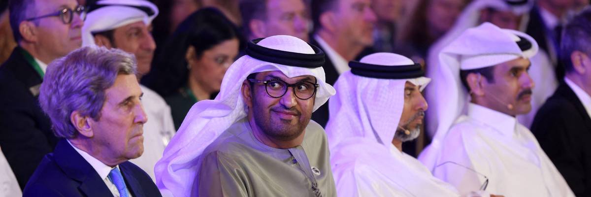 Sultan Al Jaber and John Kerry attend an event