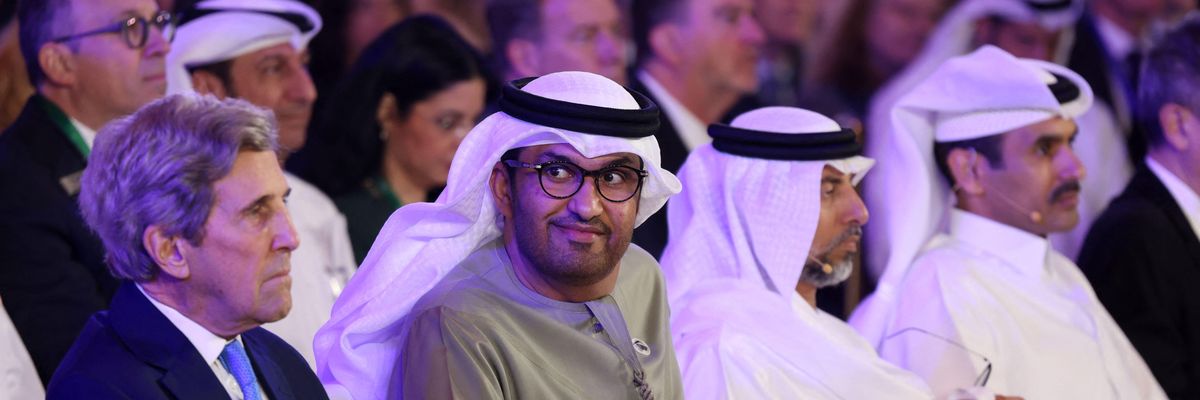 Sultan Al Jaber and John Kerry attend an event