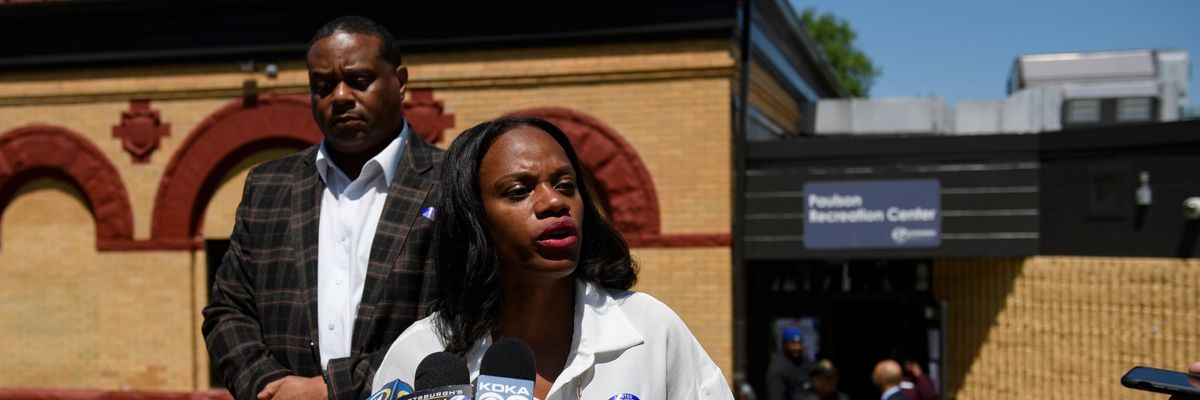 Summer Lee speaks to the press outside of a polling station