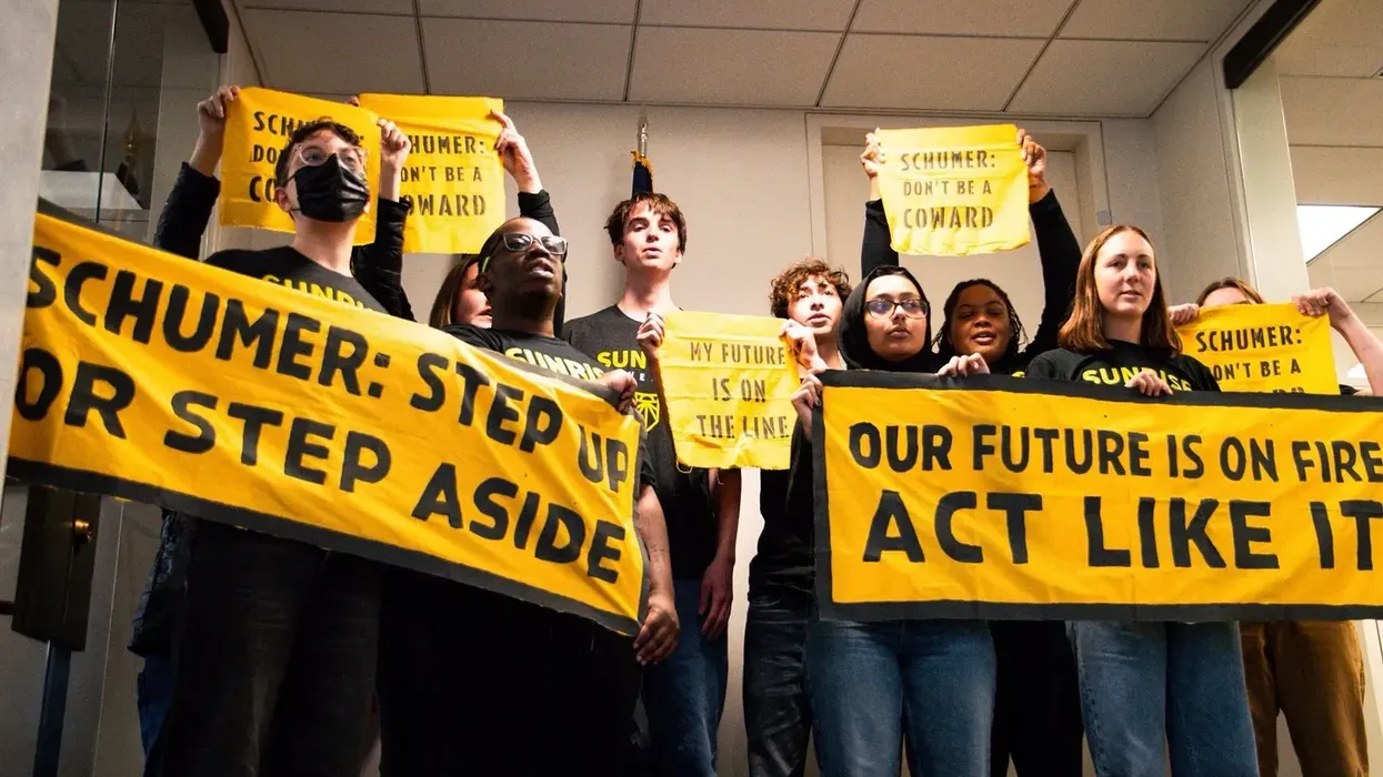 Sunrise Movement protesters demonstrate against Chuck Schumer