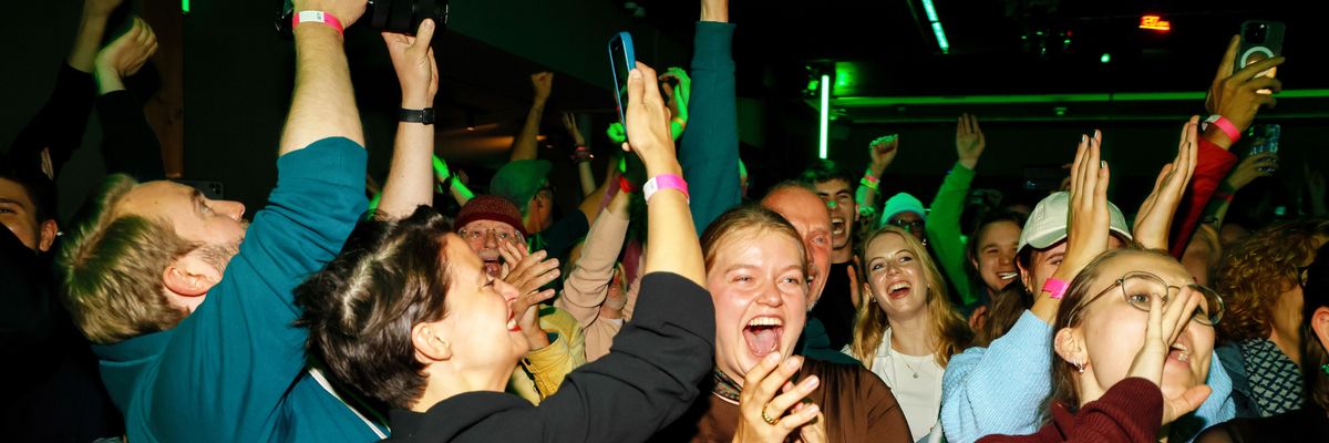 Supporters celebrate win for Hamburg climate referendum.