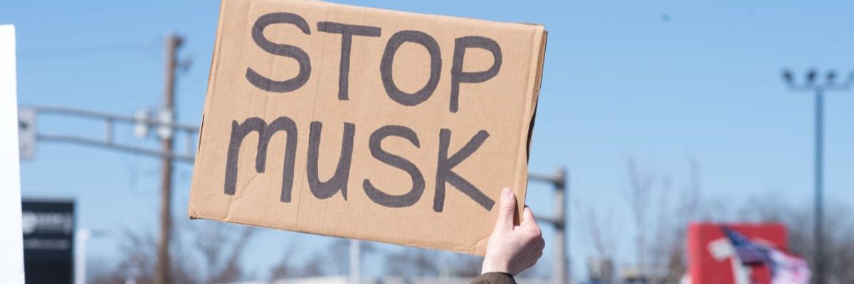 Supporters of Donald Trump and Elon Musk counter-protest outside Tesla car showroom in Chicago