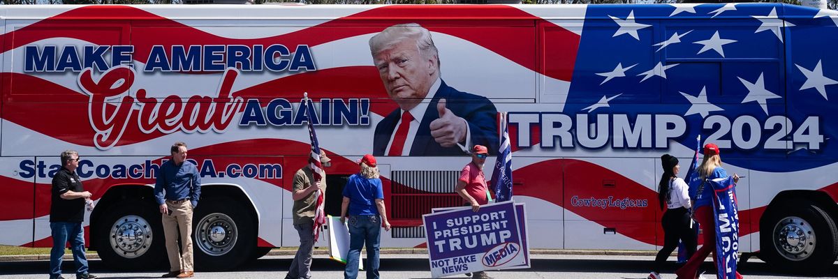 Supporters of former President Donald Trump are seen outside a stop Smyrna, Georgia