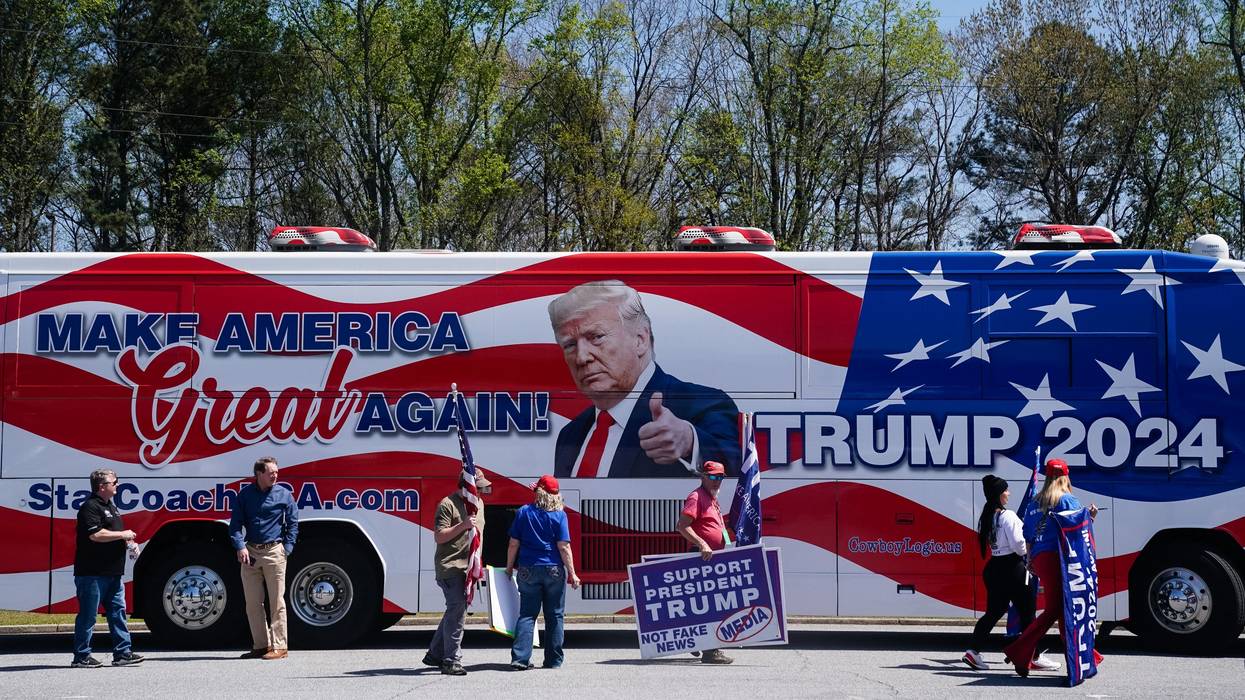 Supporters of former President Donald Trump are seen outside a stop Smyrna, Georgia