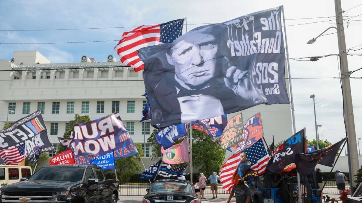 Supporters of former U.S. President Donald Trump stand outside of the Alto Lee Adams Sr. U.S. Courthouse
