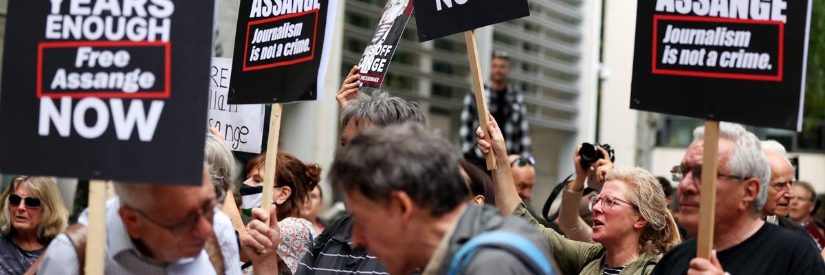 Supporters of Julian Assange demonstrate outside the British Home Office