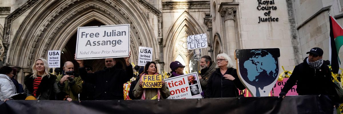 Supporters of Julian Assange gather outside of a British court