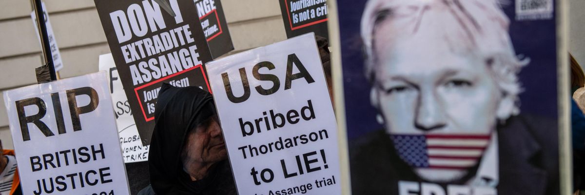 Supporters of Julian Assange rally outside of a court hearing in London