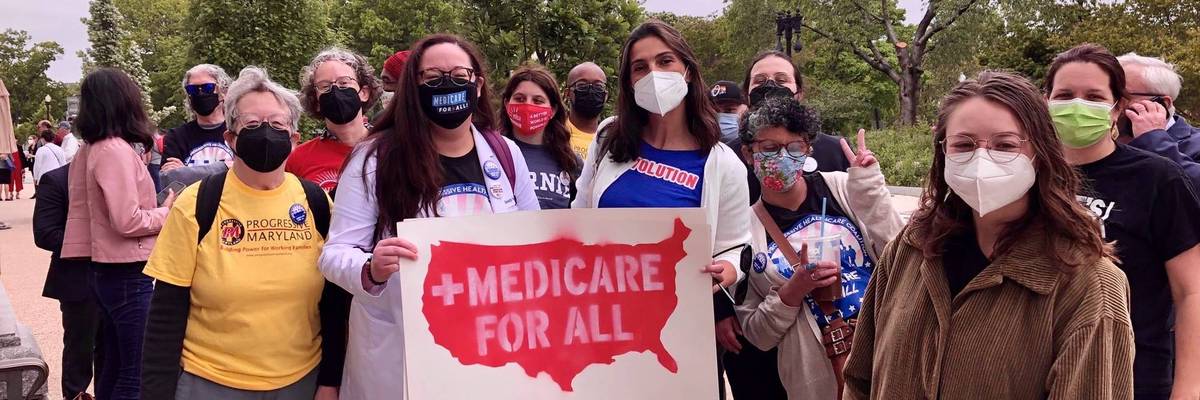 Supporters of Medicare for All pose