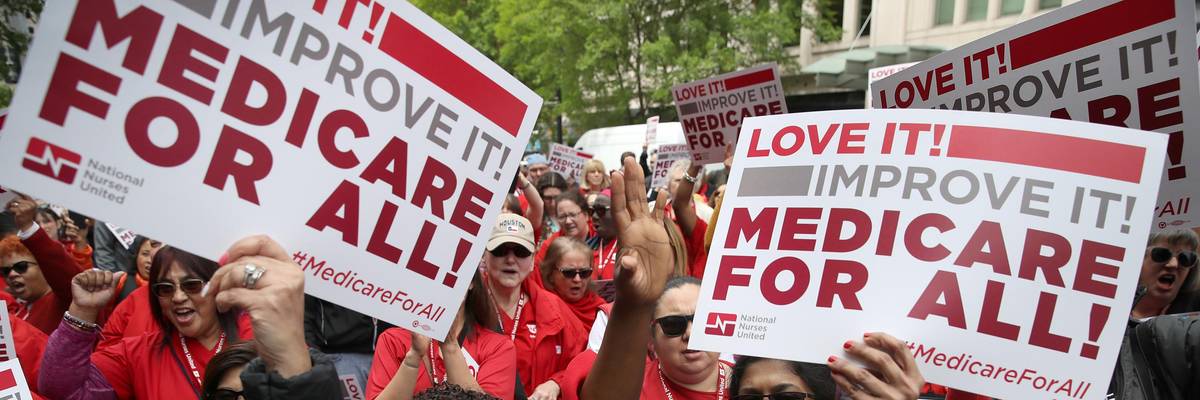 Supporters of Medicare for All protest outside PhRMA headquarters