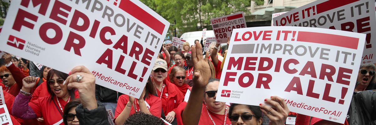 Supporters of Medicare for All protest outside PhRMA headquarters