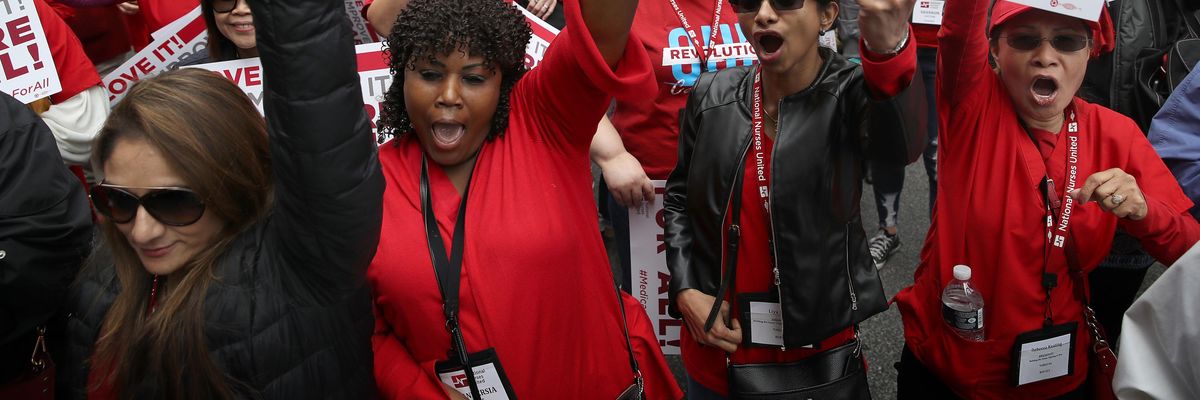 Supporters of Medicare for All protest outside PhRMA headquarters