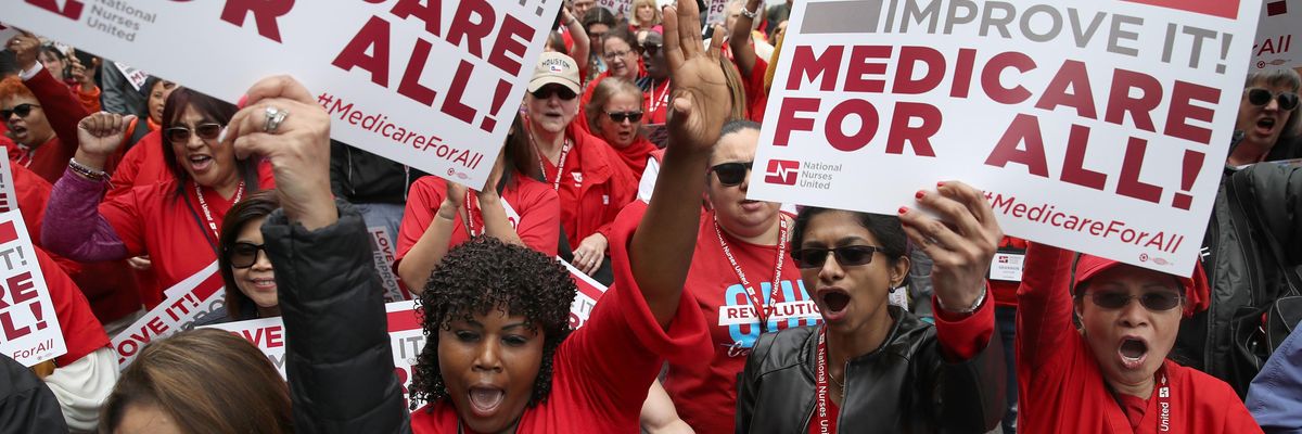 Supporters of Medicare for All protest outside PhRMA headquarters