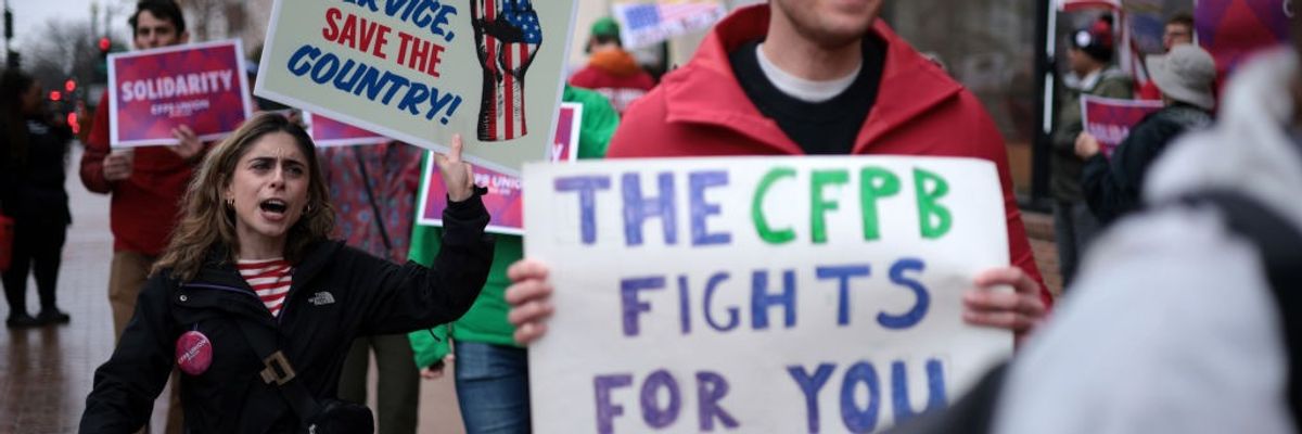 Supporters of the Consumer Financial Protection Bureau rally