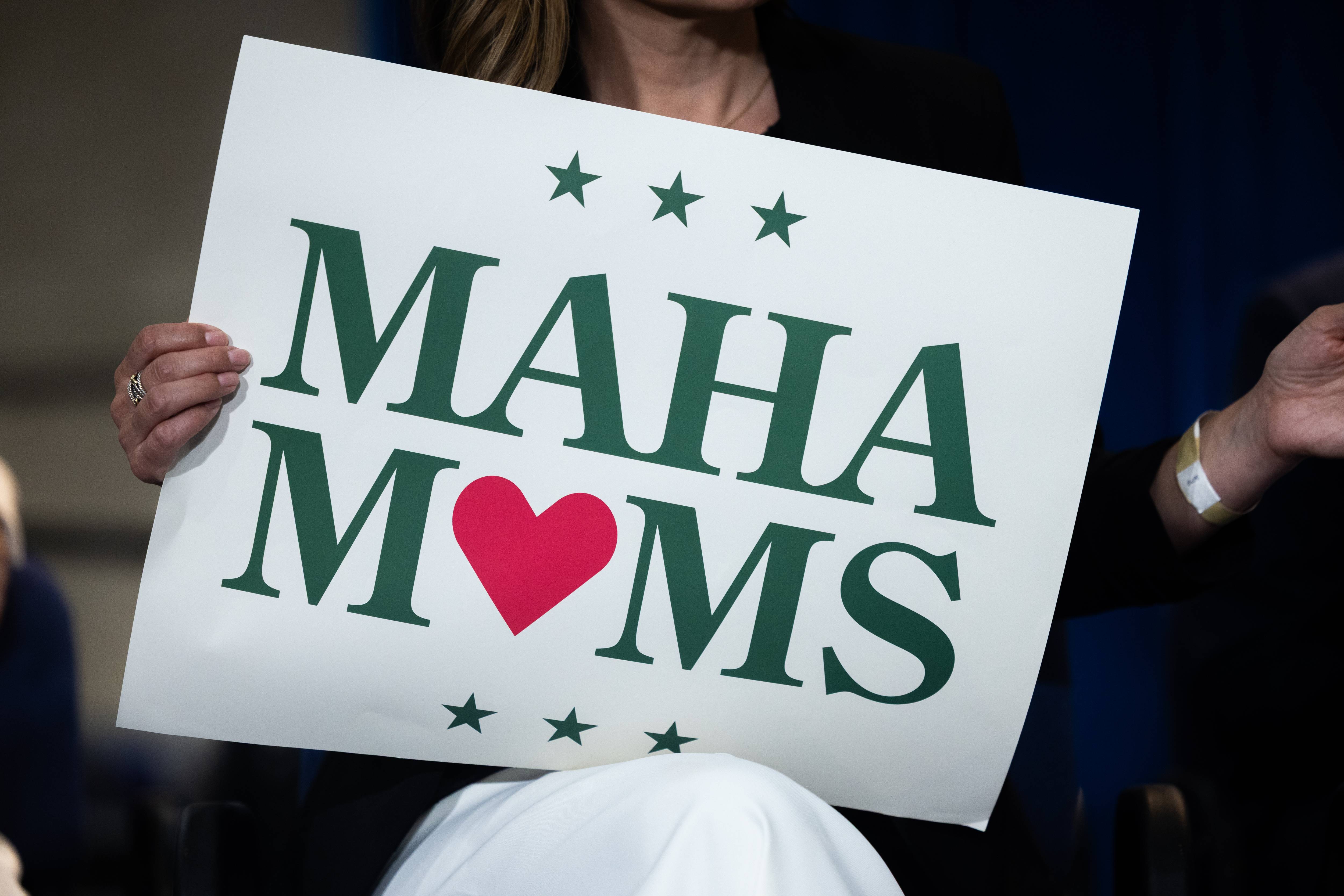 Supporters of the Make America Healthy Again movement are seen at a news conference