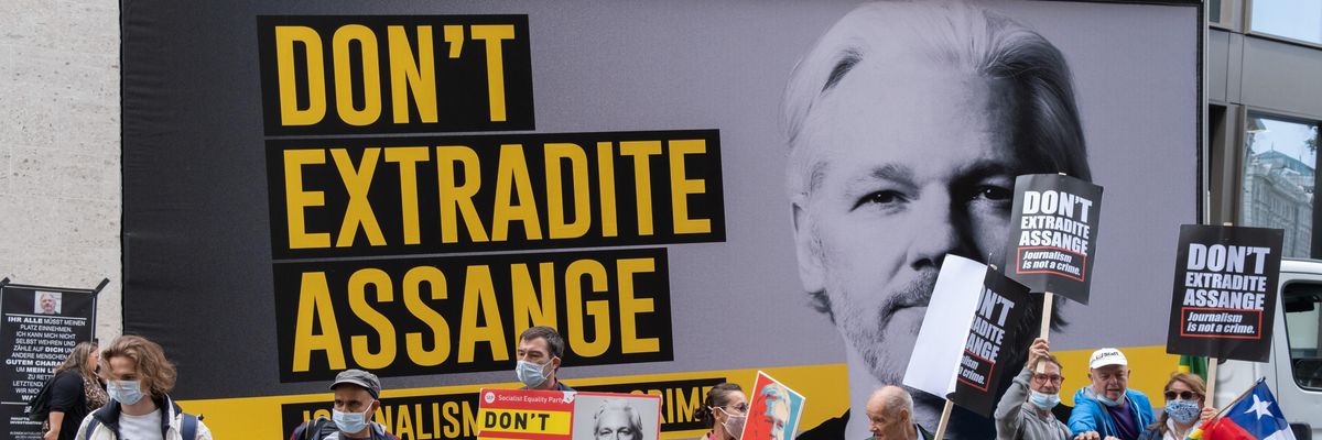 Supporters of WikiLeaks founder Julian Assange protest outside London's Old Bailey court as his fight against extradition to the U.S. resumed on September 7, 2020