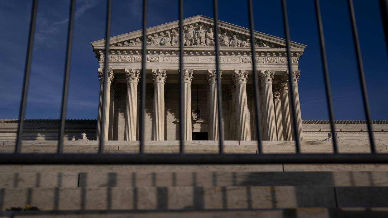 Supreme Court seen through barricades.