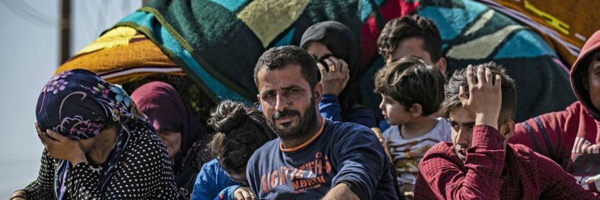 Tens of Thousands Flee Syrian Border Towns as Turkey Bombards Country Following Trump's Green Light