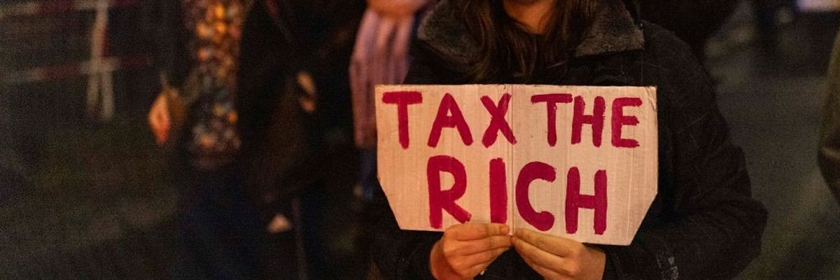 "Tax the Rich" sign in Germany