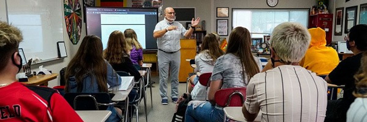 teacher and high school students