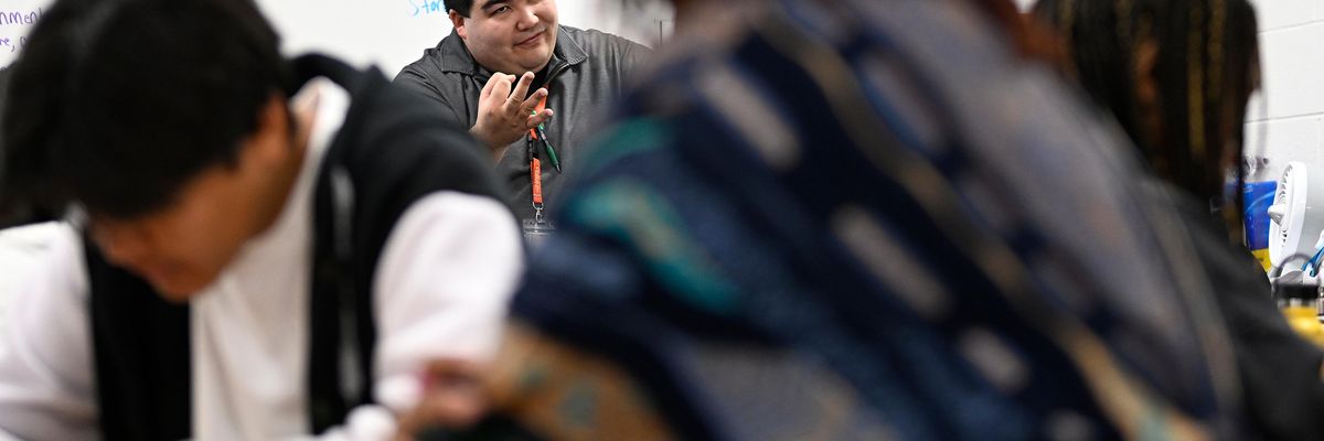 Teacher giving lesson during African American studies class