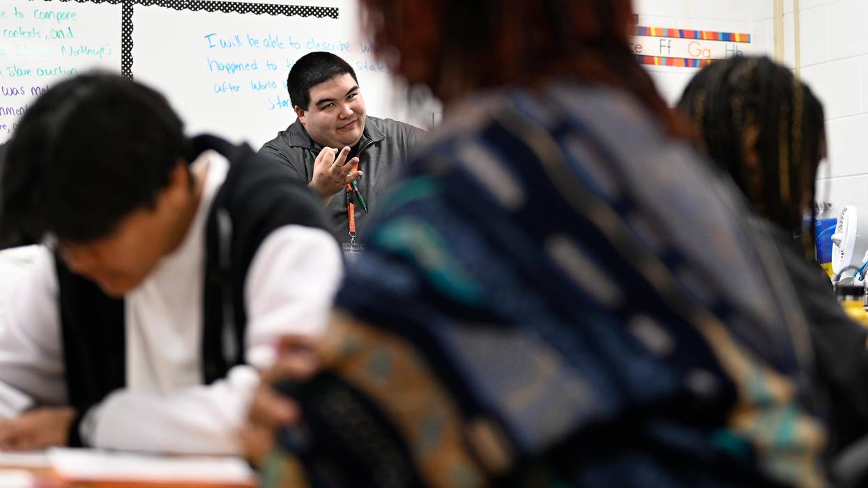 Teacher giving lesson during African American studies class