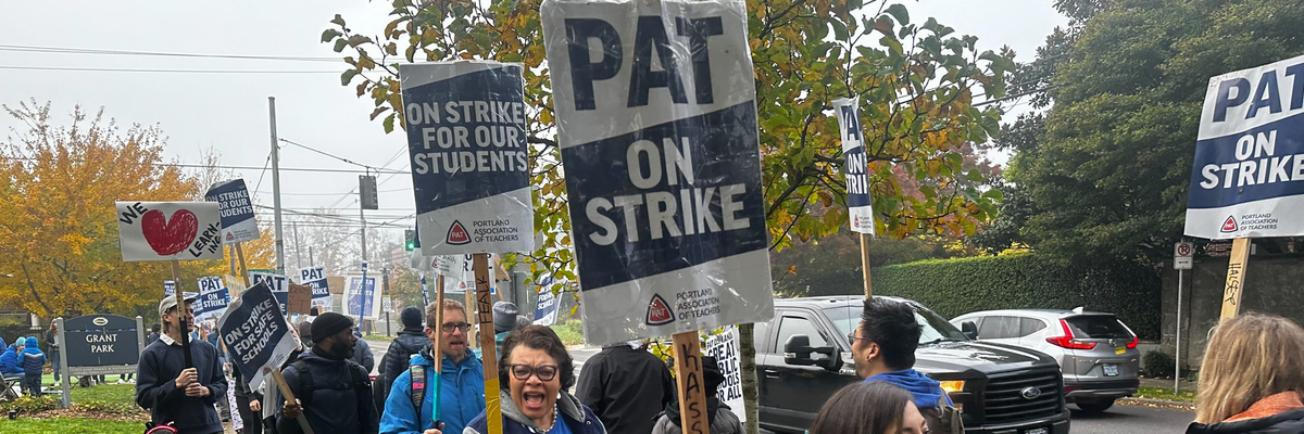 Teachers and their supporters in Portland, Oregon march on a picket line 