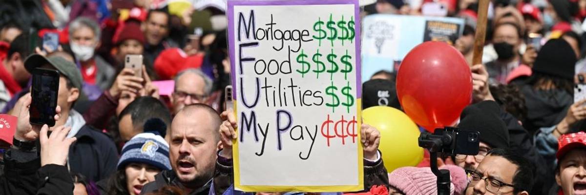 Teachers on strike over low wages.