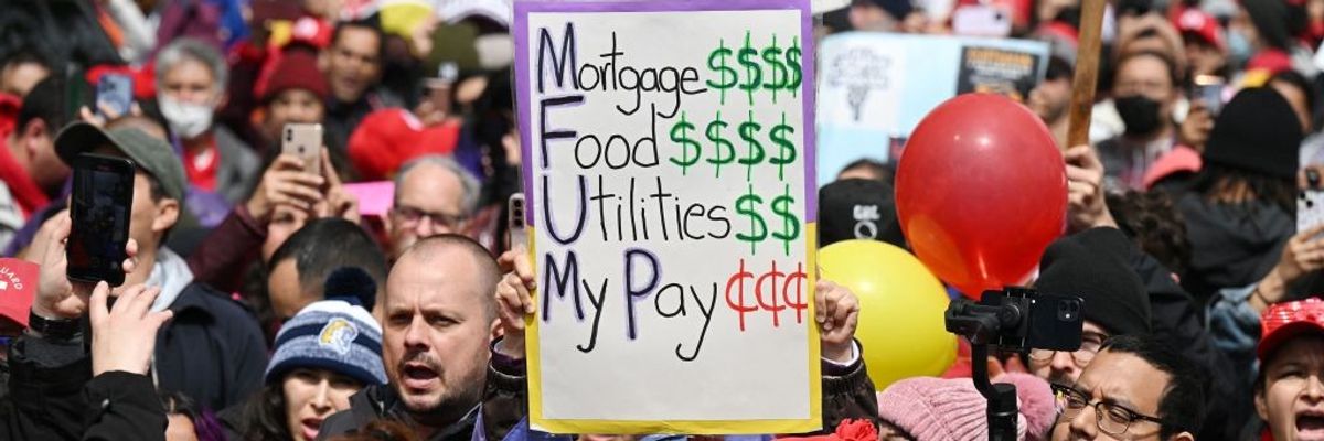 Teachers on strike over low wages.