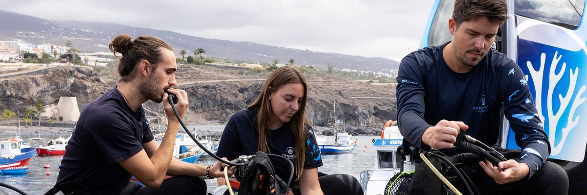 team work on scuba gear