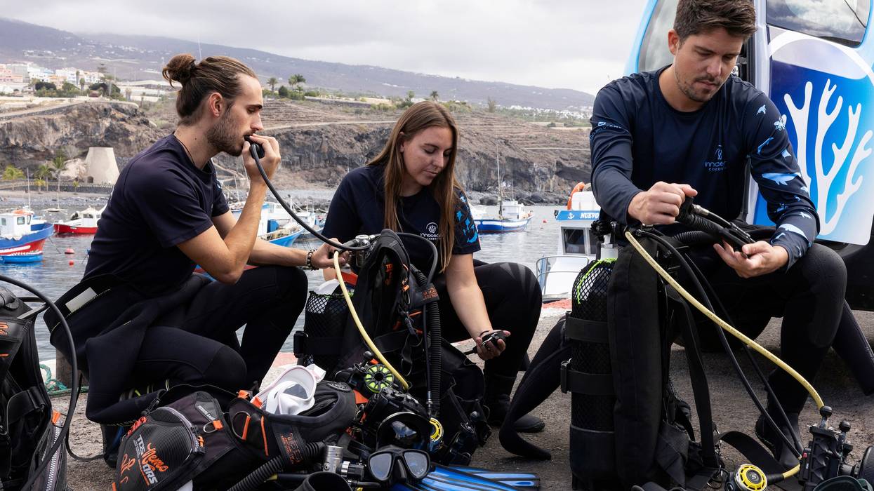 team work on scuba gear