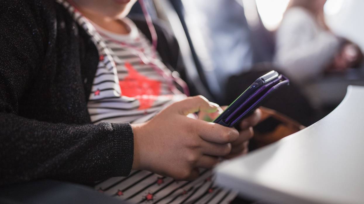 Teenage girl using smartphone