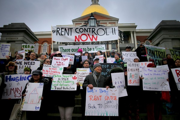 Tenants' rights groups rally outside the Massachusetts State House