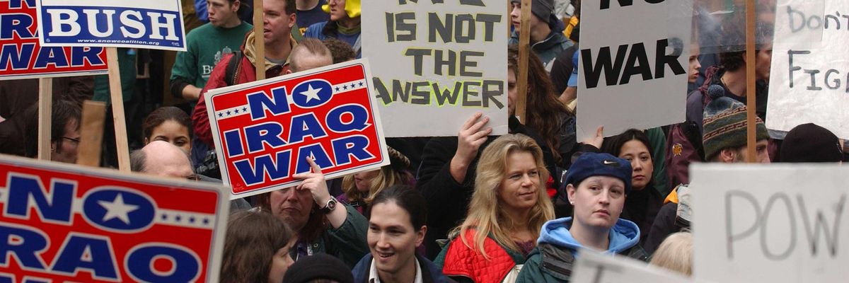 Tens of thousands of war protesters march down Fifth Street to voice concerns over a war with Iraq February 15, 2003 in Seattle, Washington.
