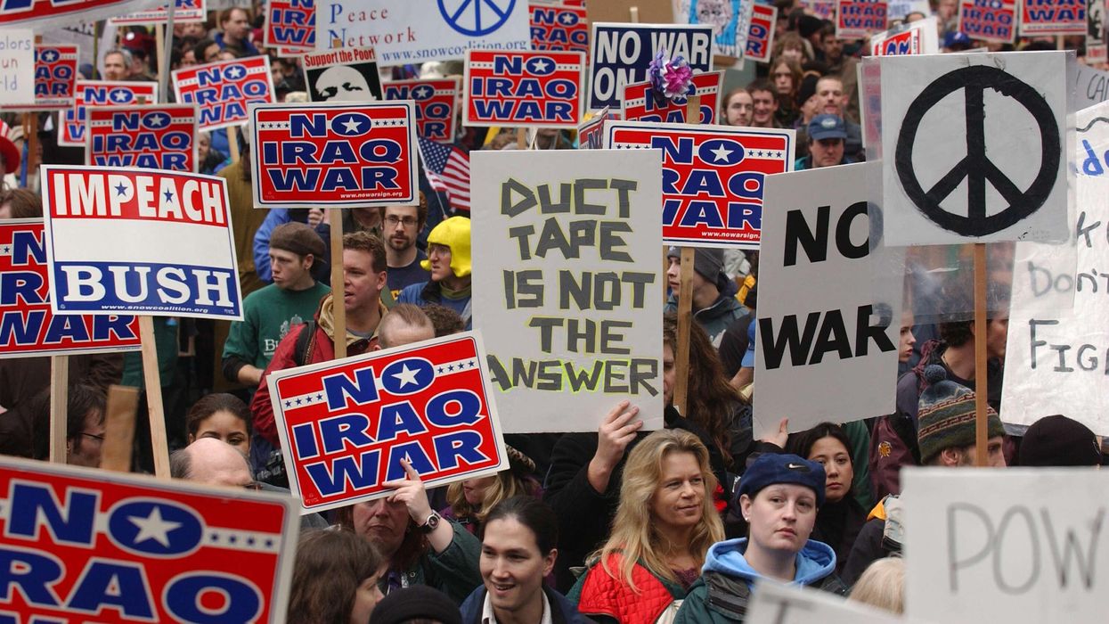 Tens of thousands of war protesters march down Fifth Street to voice concerns over a war with Iraq February 15, 2003 in Seattle, Washington.