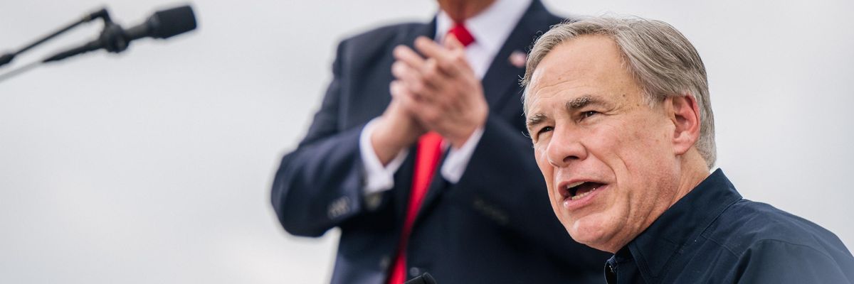 Texas Gov. Greg Abbott speaks alongside former President Donald Trump during a tour to an unfinished section of the border wall on June 30, 2021 in Pharr, Texas. (Photo: Brandon Bell/Getty Images)