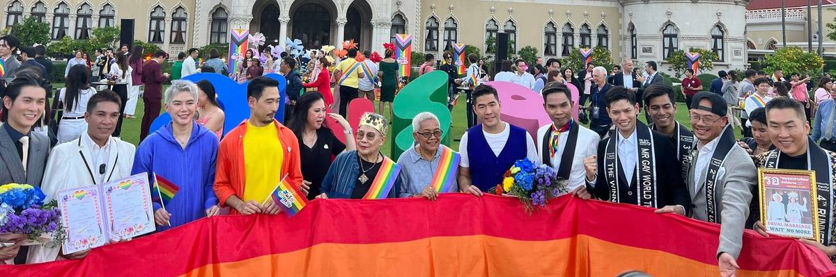Thai activists celebrate the Senate's vote in favor of marriage equality