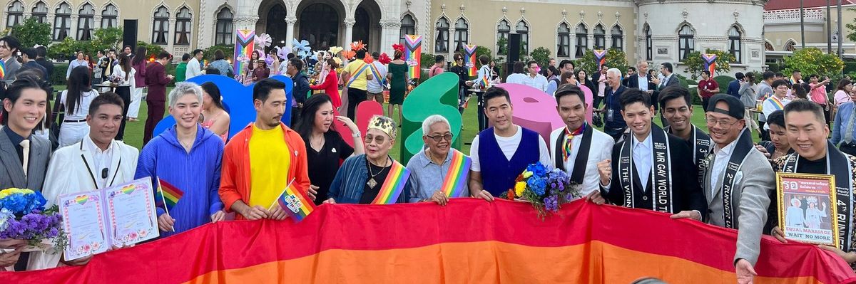 Thai activists celebrate the Senate's vote in favor of marriage equality