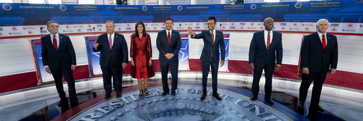 The 2024 Republican presidential primary candidates line up on stage.