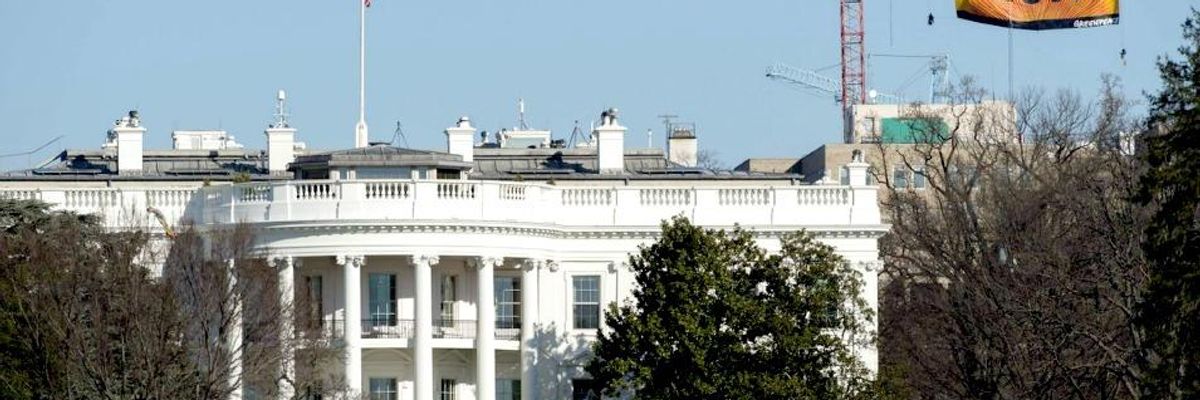 In Call to Arms, Giant 'Resist' Banner Dropped Above Trump's White House