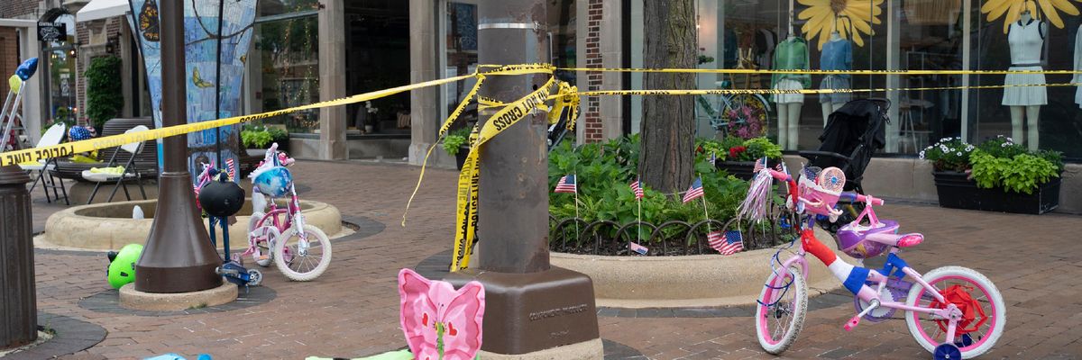 The aftermath of the Highland Park shooting is pictured