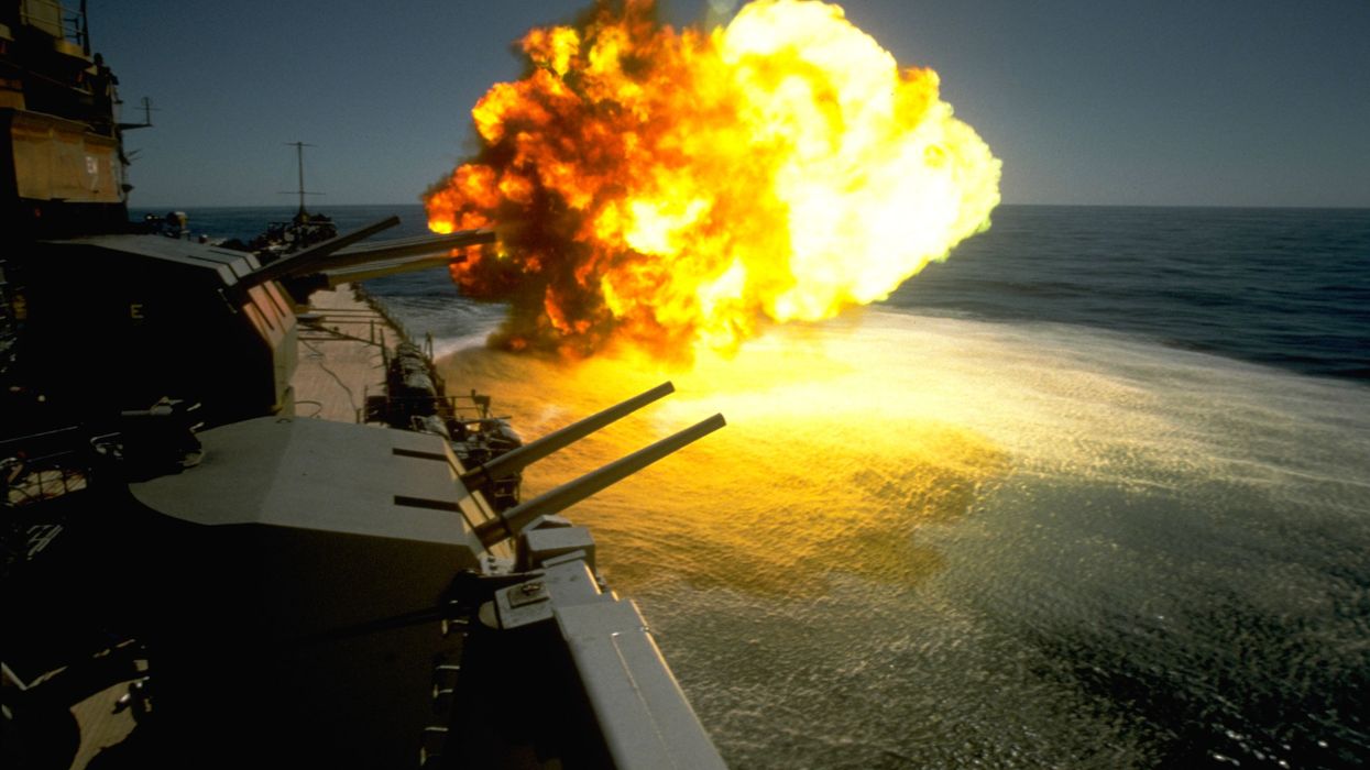 The Battleship Missouri Firing Its Guns