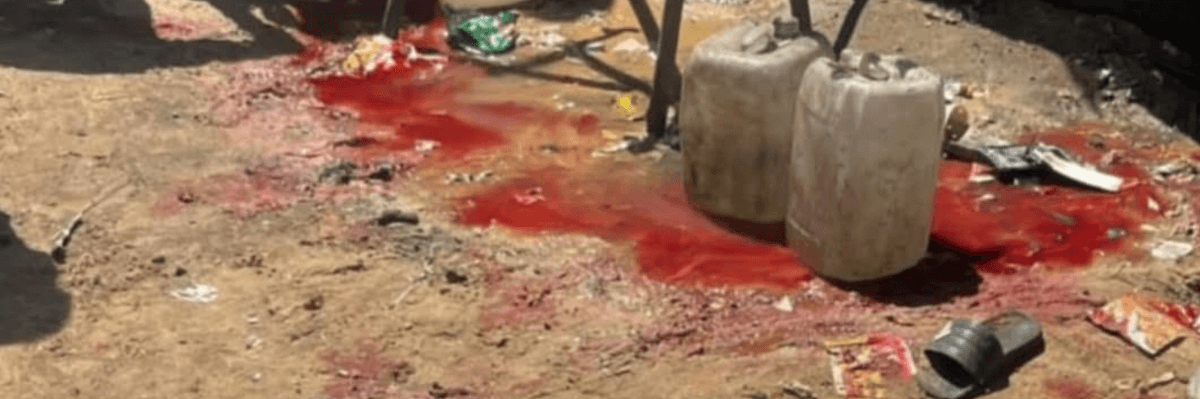 the bloody aftermath of an Israeli massacre of people collecting water