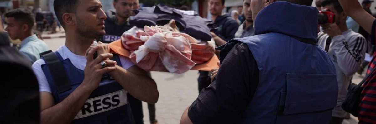 The bodies of journalist Salem Abu Tyor and his son Ahmad