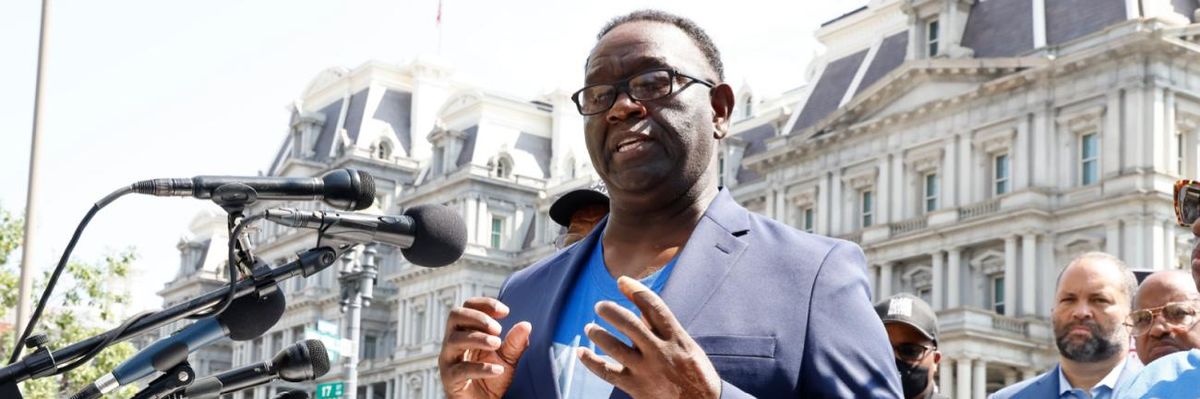 The brother of the late Rep. John Lewis speaks at a rally.