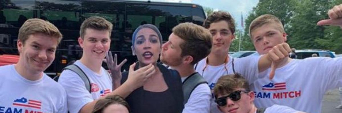 Ocasio-Cortez Responds to Photo of McConnell Supporters Groping Cutout: 'Is This Just Standard Culture of Team Mitch?'