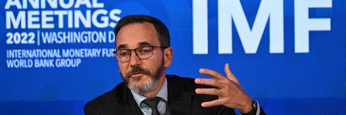 The chief economist of the IMF speaks during a press conference
