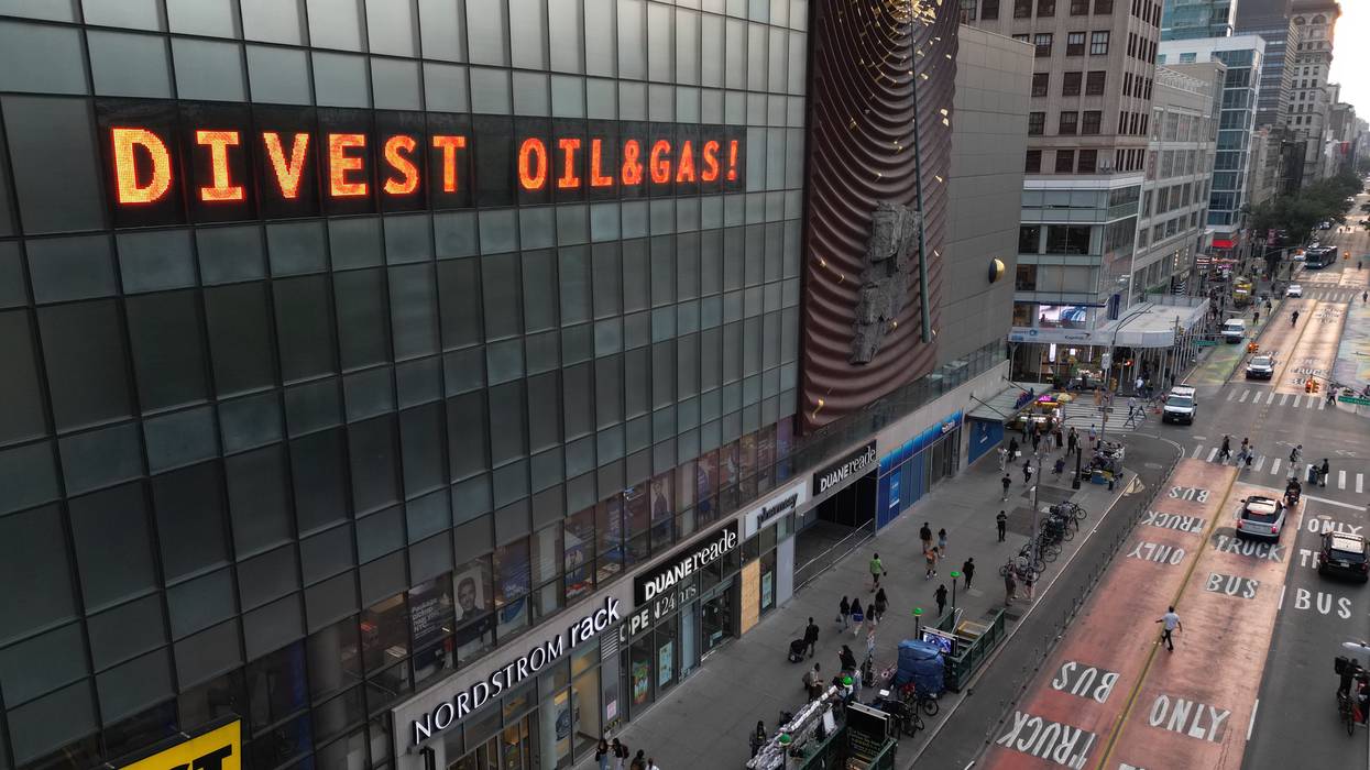 The Climate Clock in Union Square reads, "Divest oil & gas!"