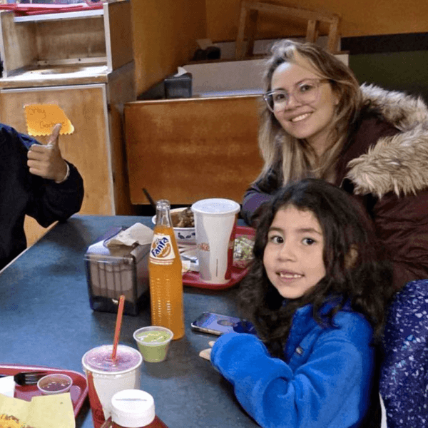 The Crespo-Gonzalez family—father Yohendry, mother Liseth, and 7-year-old Diana—pose for a photo